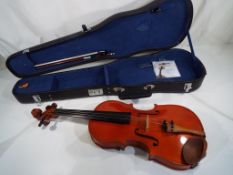 A beginner's violin, the paper label wit