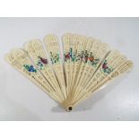 A Chinese Carved Ivory Brise Fan,
