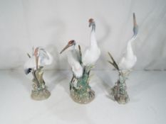 Lladro - Three figurines by Lladro depicting cranes to include 1612 'Preening Crane',