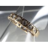 A lady's 9 carat yellow gold full eternity ring set with spinnels, approx. 2.
