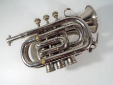 A silver plated Pocket Cornet marked Boosey by Bessons & Co, London, H75983,