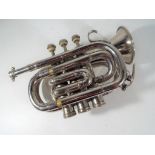 A silver plated Pocket Cornet marked Boosey by Bessons & Co, London, H75983,