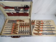 An unused good quality cased 24-piece Chef's set of Kitchen Knives and similar by Erika of Germany