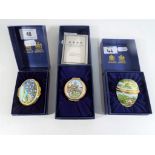 Halcyon Days Enamels - three boxed Halcyon Days enamels one commemorating the Millennium,