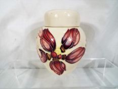 Moorcroft - a good quality Moorcroft ginger jar decorated in the Frangipani pattern,