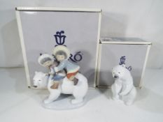 Lladro - Two boxed Lladro figurines to include 1208 'Polar Bear' and 5353 'Eskimo Riders' both