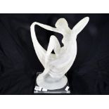 A decorative figurine depicting an Art Deco style lady approx 34.