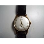 A gentleman's gold plated manual wind wristwatch by Baume & Co.