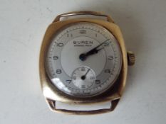 A gentleman's 9 carat gold cased wristwatch, the dial scribed Buren Grand Prix, Arabic numerals,