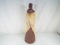 A Soul Journeys large Masai lady figurine carrying a child issued in a limited edition by Stacy