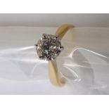 A lady's 18 carat yellow and white gold single stone diamond ring set with .