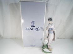 Lladro - A boxed Lladro figurine entitled 'In Touch With Nature' 6572,
