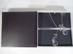 Waterford Crystal - a sterling silver Waterford Crystal lariat necklace in original box.