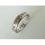 A hallmarked 9 carat white gold stone set eternity ring, size M, approx weight 3.