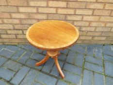 A good quality light wood circular table approx 48cm (h) x 33cm (diam) - This lot MUST be paid for
