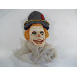 A good quality ceramic wall mask in the form of a clown entitled Auguste,