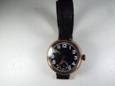 A gentleman's 9 carat rose gold cased wristwatch, assay marked for 1915, manual wind movement,