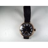 A gentleman's 9 carat rose gold cased wristwatch, assay marked for 1915, manual wind movement,