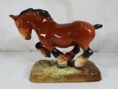 Royal Doulton - a Royal Doulton figurine Punch Peon Chestnut Shire Horse HN2623,