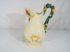 Clarice Cliff - a Clarice Cliff ceramic water jug decorated in the Celtic Harvest pattern with