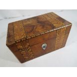 A 19th century crossbanded burr walnut twin-division tea caddy with mahogany square lids,