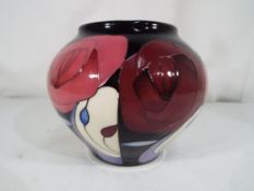 Moorcroft - a good quality Moorcroft vase decorated in the Bella Houston pattern,