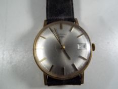 A gentleman's manual wind Rotary wristwatch, yellow metal case,