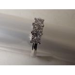 A lady's 9 carat white gold 25 point 1/4 carat diamond cluster ring, approx 2.