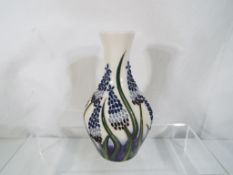 Moorcroft - a good quality Moorcroft vase decorated in the Muscari pattern,