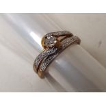 A lady's 9 carat gold diamond set, two-piece, twin-set ring, approx 2.