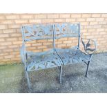 A metal garden bench seat