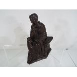 A Tara Chanda bronze depicting a classic figure of a seated woman with draped garments,