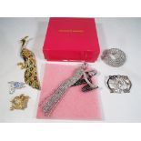 Butler & Wilson - A Butler & Wilson of London dancing couple set with clear and jet Swarovski