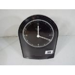 A Junghans radio controlled, battery operated mantel clock, self regulating, automatic,