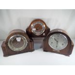 Three Westminster chiming mantel clocks to include one by Smiths Enfield and two others Estimate