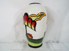 Lorna Bailey - a Lorna Bailey vase entitled Cherry Hill, approximate height 21 cm.