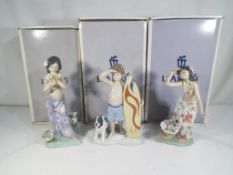 Lladro - Three boxed Lladro figurines comprising 1480 'Aroma of the Islands',