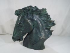 An Austin sculpture of a dressage horses head, plaster - enamelled with a bronze finish,