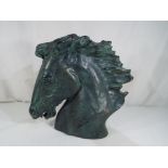 An Austin sculpture of a dressage horses head, plaster - enamelled with a bronze finish,