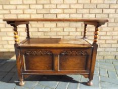 A monks bench approx height with open lid 93cm x 81cm x 40cm - height with lid down 72cm Est £40 -