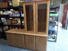 Two good quality contemporary cabinets and a display cabinet with glass fronted doors,