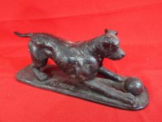 A bronze animalier, terrier playing with football on base, cast signature A P J Mene,