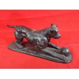 A bronze animalier, terrier playing with football on base, cast signature A P J Mene,