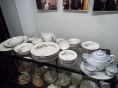 Sixty pieces of Meiko china comprising plates, cups, saucers,