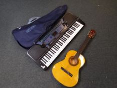 A beginners guitar bearing paper label marked Herald model MG104M contained in a soft carry case by
