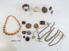 A good mixed lot to include a Mourning Locket, napkin ring stamped 925, watch chains,