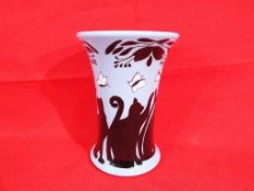 Moorcroft Pottery - a Moorcroft vase entitled The Lucky Black Cat,