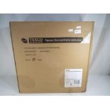 Unused retail stock - a Tesco square coal kettle barbecue serial No.