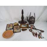 A good mixed lot to include a white metal teapot, a collection of Indian figures, decorative plate,