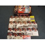 A large quantity of approx 100 Manchester United books and football programmes ranging from the